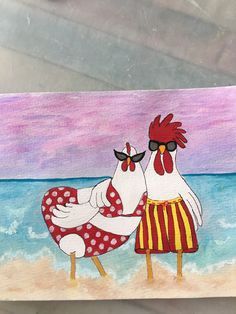 a painting of two roosters on the beach, one is holding his arm around the other