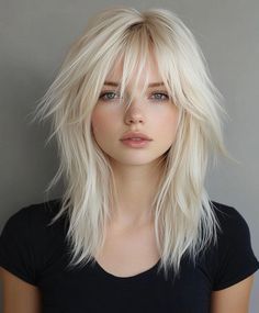 Add waves to your platinum blonde shag with feathered layers for a softer, more relaxed look. The waves enhance the texture of the feathered layers, creating a beachy, carefree vibe that’s perfect for everyday wear. Feathered Shag Haircut, Platinum Blonde Haircut, Rock Chick Hair, 80s Pictures