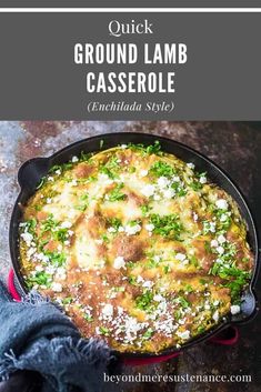 a skillet filled with ground lamb casserole and topped with parsley