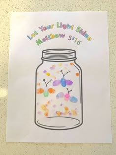 a poster with a jar full of colorful confetti and the words let your light shine on it