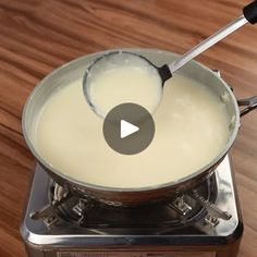 a video demonstrating how to make cream in a saucepan