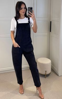 Full length, straight leg dungarees with two pockets on the front and two on the reverse. Finished with a tie shoulder strap that can be tied as tight as needed. These are a relaxed fit with room for layering. They also have a small amount of elastic in the sides which gives some shape at the waist for more flattering fit than most standard dungarees. Made from a medium weight black cotton cord with small percentage of elastane. Lounge, Summer, Winter, Date night in, Staycation, Evergreen, Going Black Dungarees Outfit, Dungarees Outfit, Winter Date Night, Black Bullet, Date Night In, Black Joggers, Summer Winter