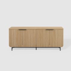 the sideboard is made from wood and has two doors, one with black legs