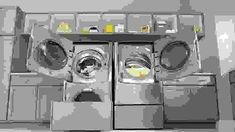 several washers and dryers stacked on top of each other in a laundry room