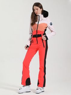 Gsou Snow Retro One-piece Ski Suit is As Cool As It Is Technical: Done In A 15k Waterproof Shell Fabric, It Has A Fitted Silhouette and A Zip-front Detail With A Belted Waist for Added Definition. It Looks Particularly Sporty On The Slopes Thanks To The Color-blocked. Nave Blue, Red, Black, White, 4 Color to Choose. Jumpsuit Chic, Ski Fashion, Ski Suit, Ski Suits, Ykk Zipper, One Piece For Women, Fur Trim, Waist Belt, Chest Pocket