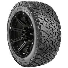 an all terrain truck tire with black spokes and chrome wheels on a white background