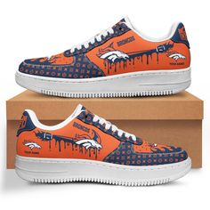 an orange and blue nike air force shoe with the denver football team on it's side