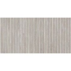 a white wall with vertical slats on it