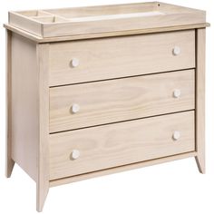 a baby crib with two drawers and a changing table in the bottom drawer is shown