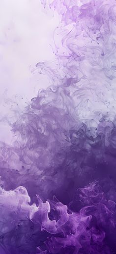 purple and white ink is swirling in the air