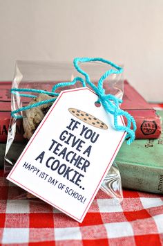 back to school printables for teachers are displayed in front of some books on a checkered tablecloth