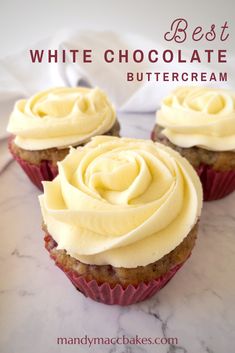 three cupcakes with white chocolate frosting on top and the words, best white chocolate buttercream