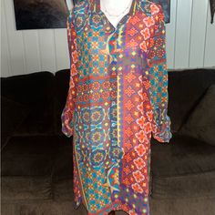 New W/Tags “Multiples” Vintage Tunic Blouse Size Medium W/ Mandala Design. This Is A Beautiful Sheer Blouse With Fall Colors. Details: 1.) Breast: 40” Inches 2.) Waist: 42” Inches 3.) Hip: 40” Inches 4.) Sleeve Length: 23-26” In. (Can Roll Up For Style) 5.) Shoulder To Shoulder: 16” In. 6.) 7 Buttons For Closure 7.) Shoulder To Hem: 35” Inches 8.) Size Medium 9.) 100% Polyester 10.) Machine Wash 11.) Made In China Thanks For Looking & Please Look At My Listings For More Clothes!!! Multicolor Flowy Tunic Blouse, Vibrant Long Sleeve Vacation Blouse, Flowy Multicolor Tunic Blouse, Vibrant Long Sleeve Blouse For Vacation, Spring Patterned Tunic Blouse, Casual Yellow Tunic Blouse, Vintage Multicolor Blouse For Day Out, Bohemian Blouse With Vibrant Print For Day Out, Yellow Bohemian Blouse For Daywear