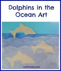 dolphins in the ocean art project with text overlay that reads dolphins in the ocean art