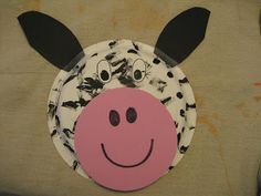 a paper plate with a cow's face on it