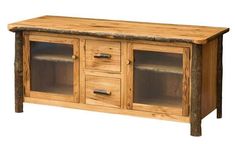 a wooden entertainment center with glass doors and drawers on one side, in the shape of a log