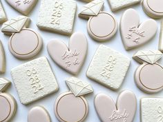 some cookies that are shaped like hearts and envelopes