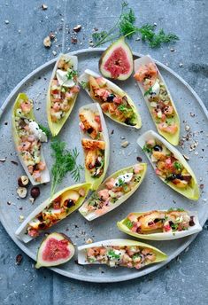 an image of food on a plate with watermelon and other things to eat