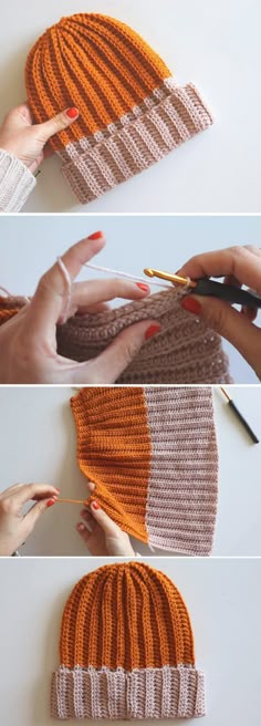 crocheted beanie hat with orange and white stripes being worked on by two hands