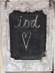 a chalkboard with the word dad and v written on it