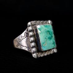 Wonderful Old Native American Navajo Green Turquoise Sterling Silver beautifully crafted Ring.  Circa 1970s. Would look great on both men and women. Size 9 1/2 Measures 7/8" tall. Weight 11.3 grams. Historically, Navajo jewelry is an important part of the Navajo people's cultural heritage. A Navajo necklace, bracelet, or earrings was worn to reflect a person's cultural identity, status, or wealth. It puts together historical significance, legend, religion, and culture into a beautiful piece of artwork. Navajo Necklace, Wire Wrap Jewelry Designs, Navajo Style, Navajo Jewelry, Cultural Identity, Navajo Turquoise, Wire Wrap Jewelry, Wrap Jewelry, Vintage Navajo