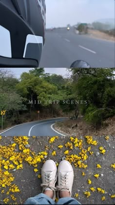 someone is sitting on the road with their feet in the air and there are yellow flowers all around