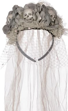 a white veil with skulls and flowers on it