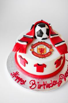 a birthday cake with a soccer jersey on it