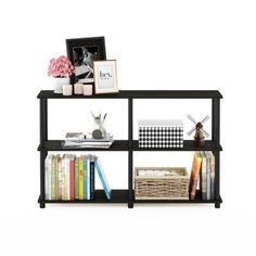 a shelf with books, pictures and other items on it's sides in front of a white background