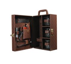 an open brown leather briefcase with many items in the compartment and one opened to show it's contents