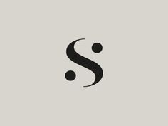 the letter s is made up of two black dots on a light gray background, and it