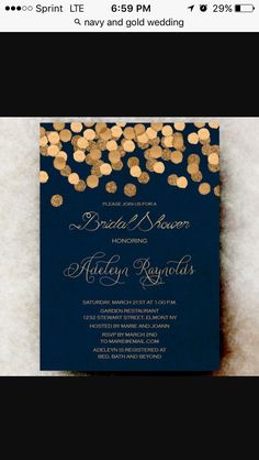 a blue and gold wedding card with confetti on it