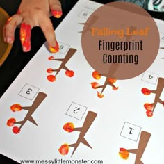 a fingerprint counting game for kids with the title falling leaf fingerprint counting on it