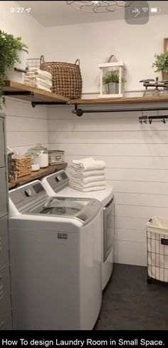 a washer and dryer in a room with shelving on the wall behind them