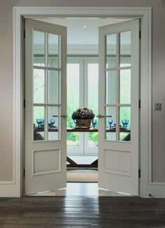 an open door leading to a dining room