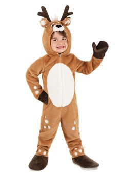 a little boy in a reindeer costume standing up with his hands out and smiling at the camera