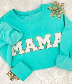 The perfect gift for Mom! A fun glittery twist on your initials! Choose up to 5 letters. Letters on the shirt are approximately 3 inches tall. Some popular words have been: Mama, Wifey, Smile, Happy! We love seeing your creativity. *If 3 or more letters are selected, will be done in the center rather than left chest! Iron On Letters Shirt Diy, Puff Vinyl Sweatshirt, Patch Crewneck, Happy Store, United Monograms, Chenille Patches, Patch Sweatshirt, Latest Obsession, Long Sleeve Baseball Tee