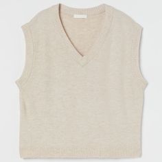 Soft, Rib-Knit Sweater Vest. V-Neck And Ribbing At Neckline, Armholes, And Hem. Runs Big. Length: Short Sleeve Length: Sleeveless Fit: Oversized Style: Sweater Vest Neckline: V-Neck Description: Light Beige Melange, Solid-Color Brand New. Final Sale. Please Ask Questions Before Purchasing. H&m Knit V-neck Top, Beige Knitted V-neck Sweater Vest, H&m Cotton V-neck Tops, H&m V-neck Cotton Tops, H&m V-neck Sweater For Spring, H&m Fitted V-neck Sweater, Style Sweater Vest, V Neck Sweater Vest, White Cropped Sweater