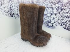 You will love winter with our brown long fur boots. Warmest boots you've ever seen! These boots will take care of your feet up to 50 degrees Celcius below zero.  Outside we use fur of nutria and inside they are insulated by a genuine sheepskin. Through the use of waterfowl animal fur can be used in the slush and mud! they don't get wet!  ADVANTAGES *Only high quality materials inside.  *3 insoles: main, felt and natural sheep fur. *Sole made of TEC (thermoplastic rubber): provides excellent adhe Brown Winter Hunting Boots, Yeti Boots, Viking Boots, Winter Boots For Men, Mukluk Boots, Fur Winter Boots, Fur Keychain, Below Zero, Love Winter