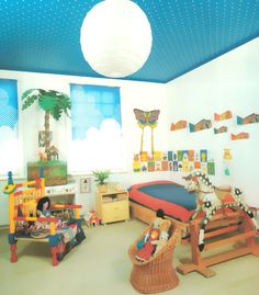 a child's bedroom with toys and decor