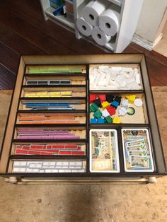 an assortment of different colored pencils in a box