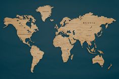 a wooden world map with the names of countries