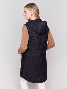 Always stay cozy and fashionable with the Long Quilted Puffer Vest. Its quilted design offers added flair while ensuring continual warmth. In classic black, it will surely be a standout piece in your fall wardrobe. The zipper front and pockets combine style with functionality, and the hood adds an extra layer of coziness. Zipper front closure Hooded design Quilted geometric pattern Side snap button closure Two front pockets Puffer Vest With Hood, Quilted Puffer Vest, Side Snap, Gilet Long, Vest Blazer, Fall Plaid, Fall Shopping, New Tops, Puffer Vest