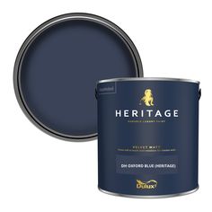 a blue paint can with the words heritage on it