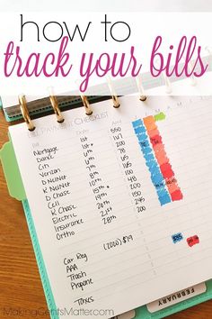 a binder with the words how to track your bills on it and an image of a