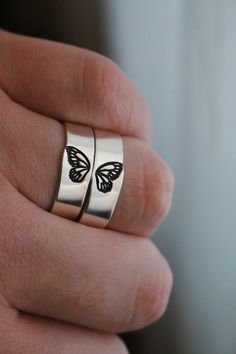 Butterflies represent change, and the courage to embrace a transformation that makes life better. Get this matching butterfly wing ring set for your best friend, sister, or partner. Featuring a gorgeous detailed butterfly wing on each ring. DETAILS: -Two Matching Rings -Each ring is hand stamped -Rings are Aluminum, Sterling Silver, Fine Silver, or 14k Gold Filled -6mm in thickness You will receive two hand-stamped rings filled with a black enamel finish. | Matching 2 Ring Butterfly Wings Stacki Matching Rings For Best Friends, Pinky Promise Best Friend, Bff Rings, Detailed Butterfly, Best Friend Birthday Gifts, Matching Promise Rings, Wing Ring, Best Friend Rings, Matching Couple Rings