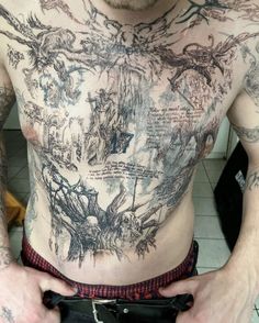 a man with many tattoos on his chest