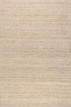 an area rug that is beige and has stripes on the bottom, with a white background