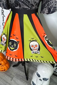 My very popular Halloween Treat design is now available in a skater skirt! This new color way is reminiscnet of vintage Halloween decorations in bright chartreuse green and orange. This flowy skirt is made from soft and smooth poly blend fabric with a bright print that will last for years. Elastic waistband and stretchy material that is super comfy. Shown here with our Tangled Web Victoria Top - purchase here. • 82% polyester, 18% spandex• Smooth fabric • Mid-thigh length • Elastic waistband Thi Vintage Green Flared Skirt Bottoms, Green Flowy Skirt For Fall, Retro Green A-line Skirt, Retro Green Skirted Bottoms, Green Skirted Skirt For Fall, Green Fall Skirt, Green Skirt For Fall, Retro Green Skirt For Fall, Orange Skirt