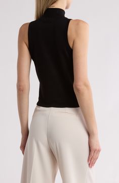 This sleeveless top in an easy, figure-hugging fit is an excellent addition to your chill-time wardrobe. Mock neck Sleeveless 75% rayon, 25% nylon Dry clean Imported Spring High Stretch Tank Tops, Fitted Sleeveless Casual Camisole, Fitted Casual Sleeveless Camisole, Casual Fitted Sleeveless Camisole, Chic Fitted Tank Knit Top, Chic Sleeveless Elastane Tank Top, Stretch Elastane Vest Top, Chic Fitted Crew Neck Tank Top, Casual High Stretch Camisole Top